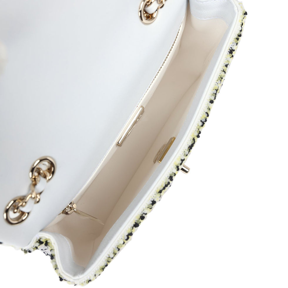 Thumbnail: Open interior of the bag showing the white leather lining and the light gold turn-lock mechanism
