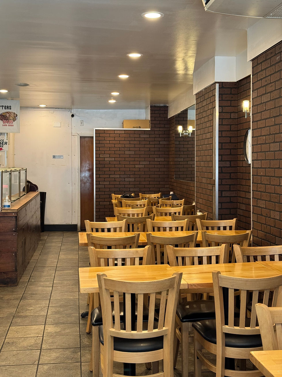 “Interior of Swagat Indian Restaurant in Manhattan, featuring cozy seating and warm lighting