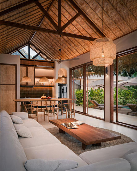 Open-plan living room with vaulted ceilings in a luxury villa for sale Serangan Lombok.