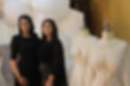 Two women with wedding dresses