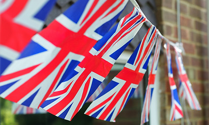 Union Jack bunting outside a suburban English house.jpg