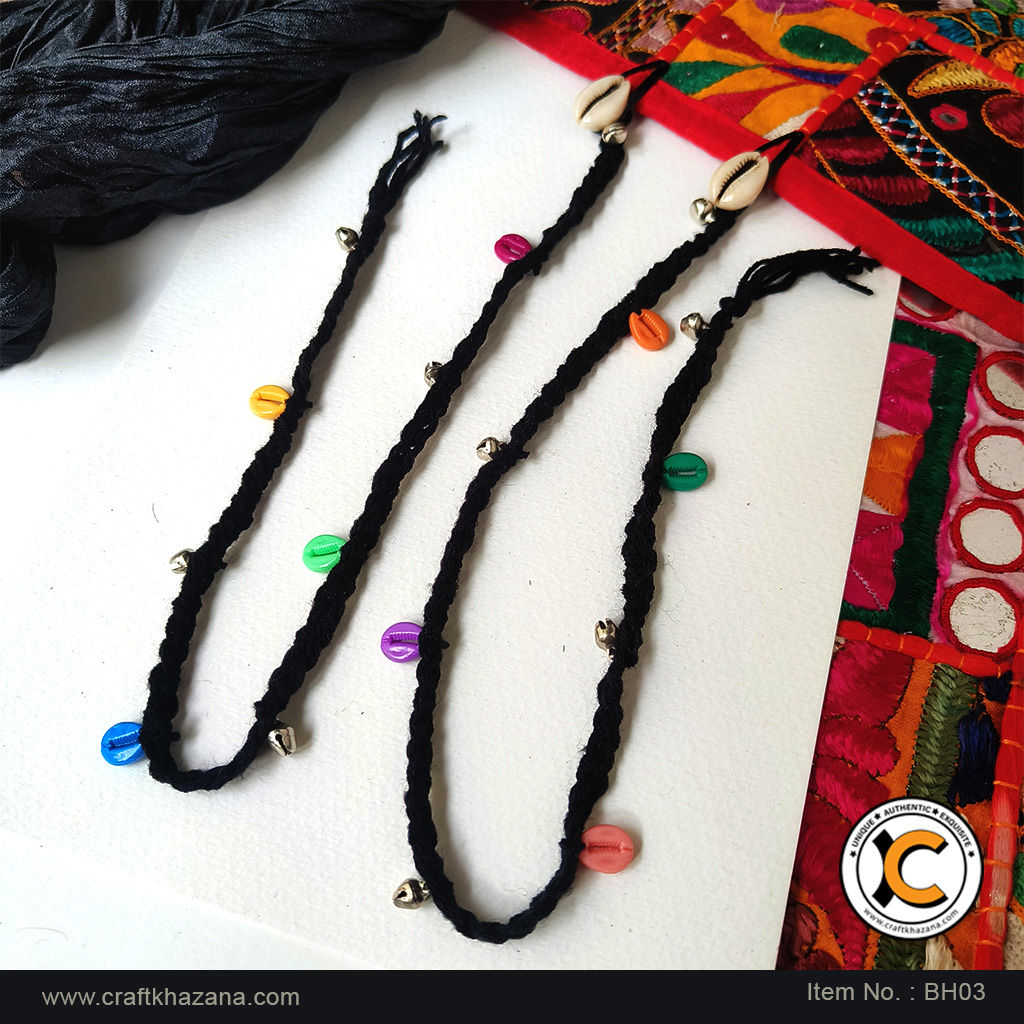 Handmade black boho hair braids with colourful cowrie shells and metal ghungroo bells by Craft Khazana