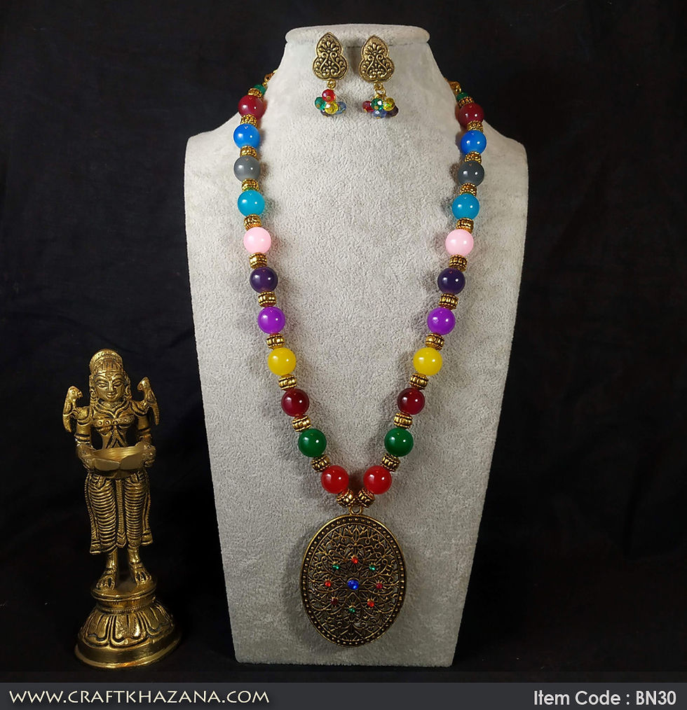Thumbnail: Kavya, multi color beaded necklace set with gold tone pendant.