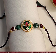 meenakari-lotus-rakhi-on-green.jpg