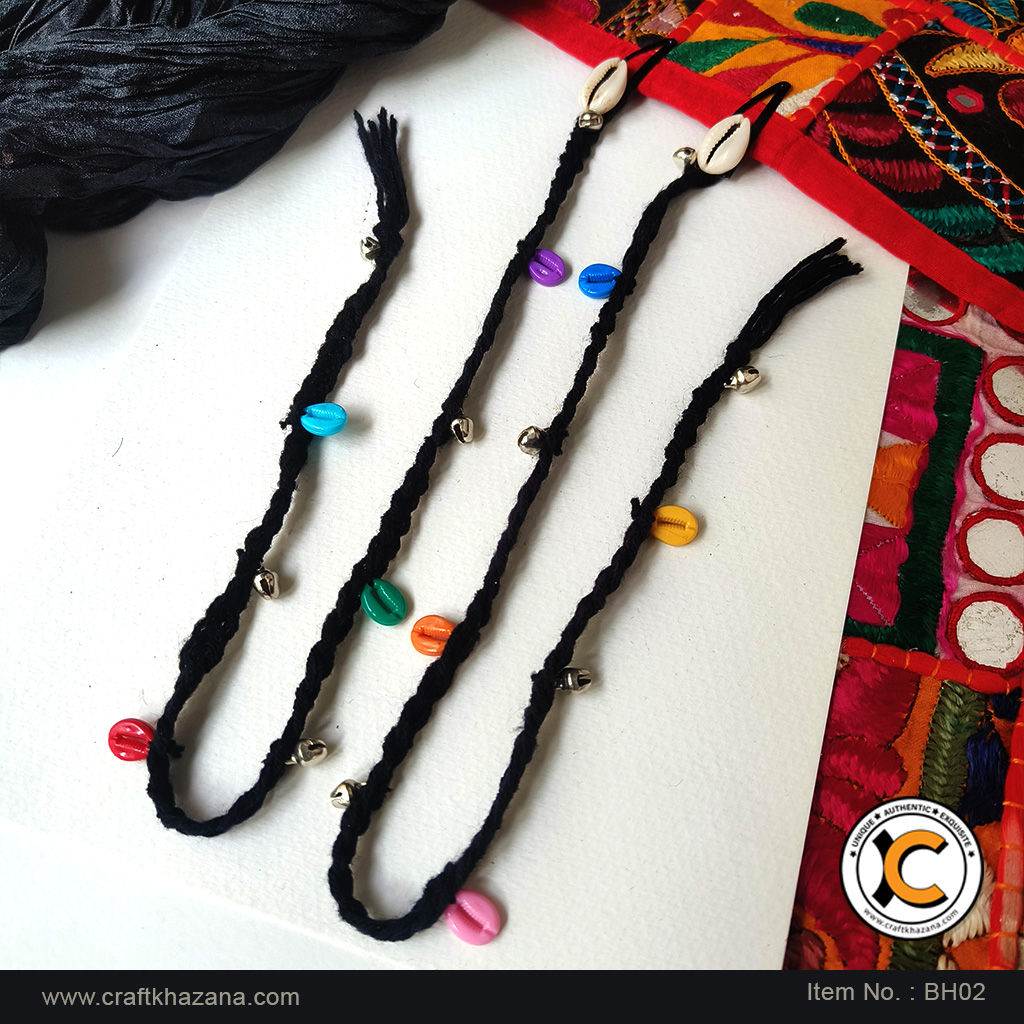 Handmade black boho hair braids with colourful cowrie shells and metal ghungroo bells by Craft Khazana