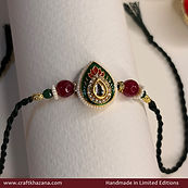 Green-tear-drop-meenakari-rakhi.jpg