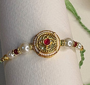 meenakri-rakhi-green-and-pink-stones.jpg