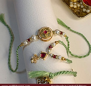 pista-green-and-ruby-meenakari-bhaiya-bhabhi-set-in-lumba-style.jpg