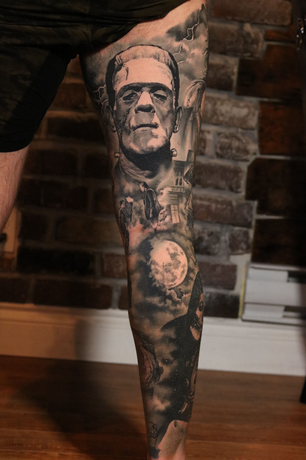 Frankenstein black and grey large scale horror leg sleeve tattoo by Michi, Vancouver tattoo artist