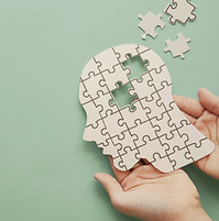 Kopf aus Puzzleteilen