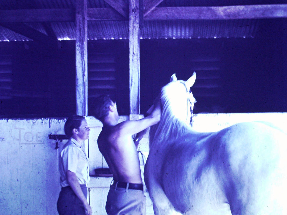 Eric Denning and a young boy at the Churchlands Police Stables