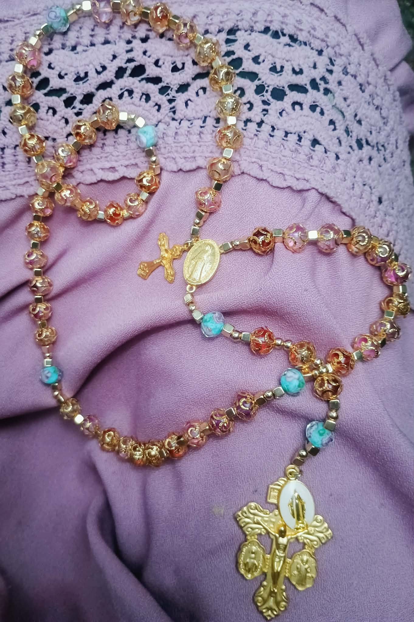 Beautiful gold bracket beaded Rosary by artist Mica.