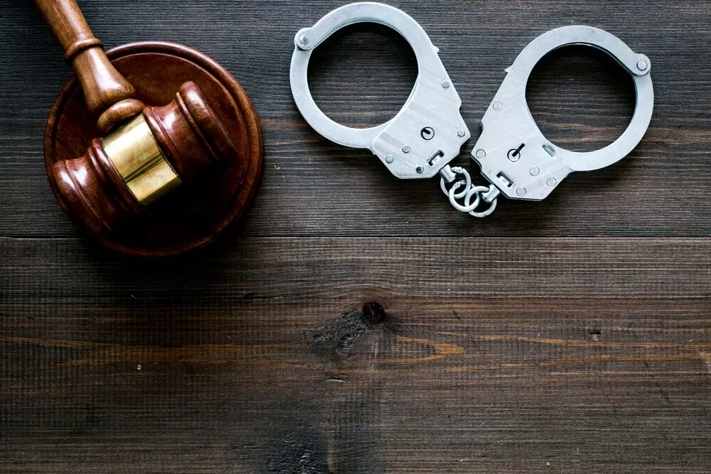 judges-gavel-and-handcuffs.webp