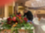 Thumbnail: A blonde woman arranging flowers 