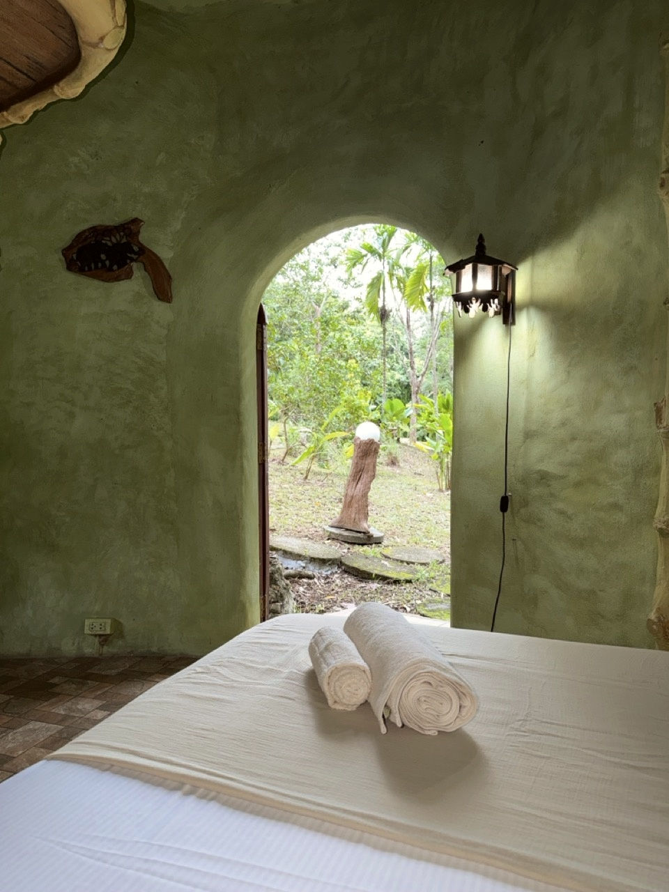 Bedroom looking toward doorway in Mushroom House at Treehouses Yao Noi