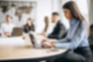 group-of-people-working-out-business-plan-in-an-office (1).jpg