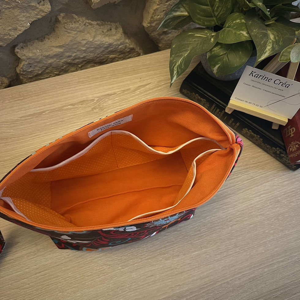 Thumbnail: Brown toiletry bag with colorful patterns