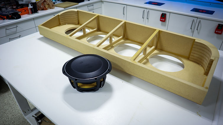 Background image of subwoofer and custom made subwoofer enclosure