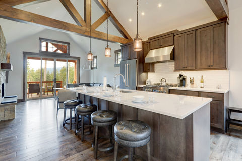 Amazing modern and rustic luxury kitchen with vaulted ceiling and wooden beams, long islan