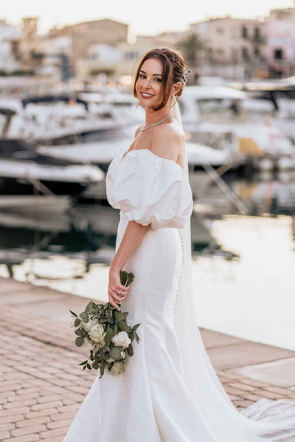 bride posing for photos in Palm de Mallorca photo by Rey Weddings