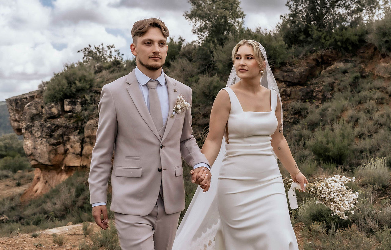 Masia Mas d'en Bosh wedding photography of walking bride and groom