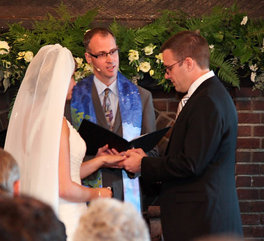 Justin Schroeder officiating a wedding