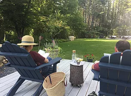 COUPLERELAXING ON DECK_JPG.webp