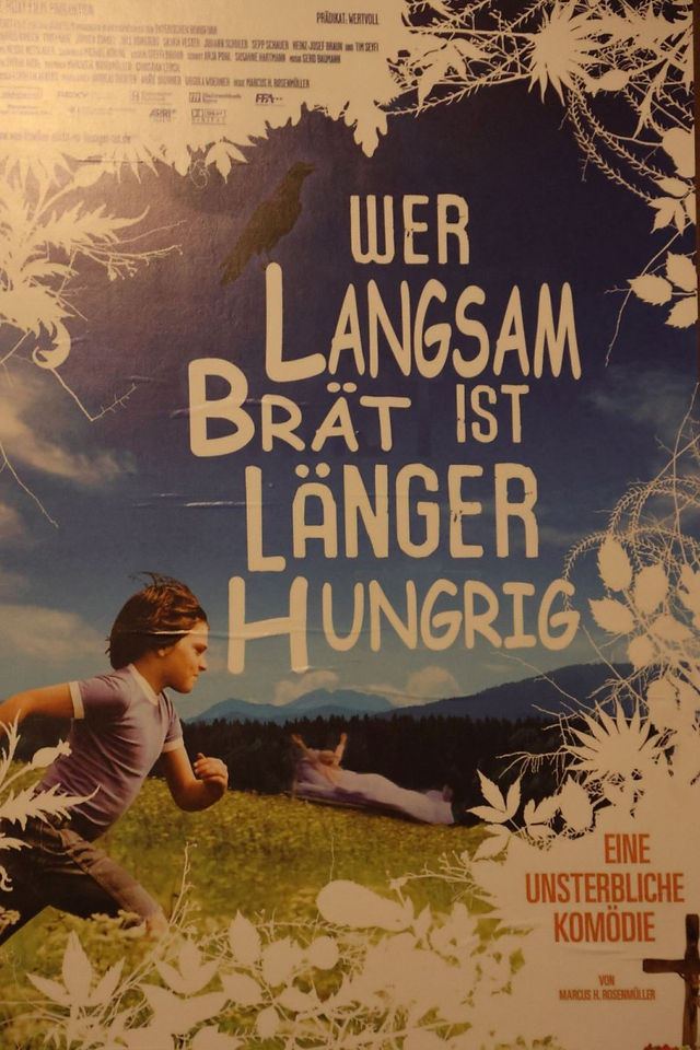 Filmplakate im Kinosaal