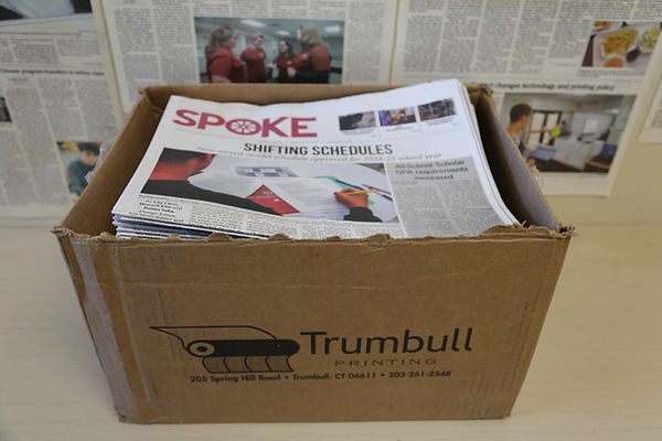 A stack of The Spoke newspapers