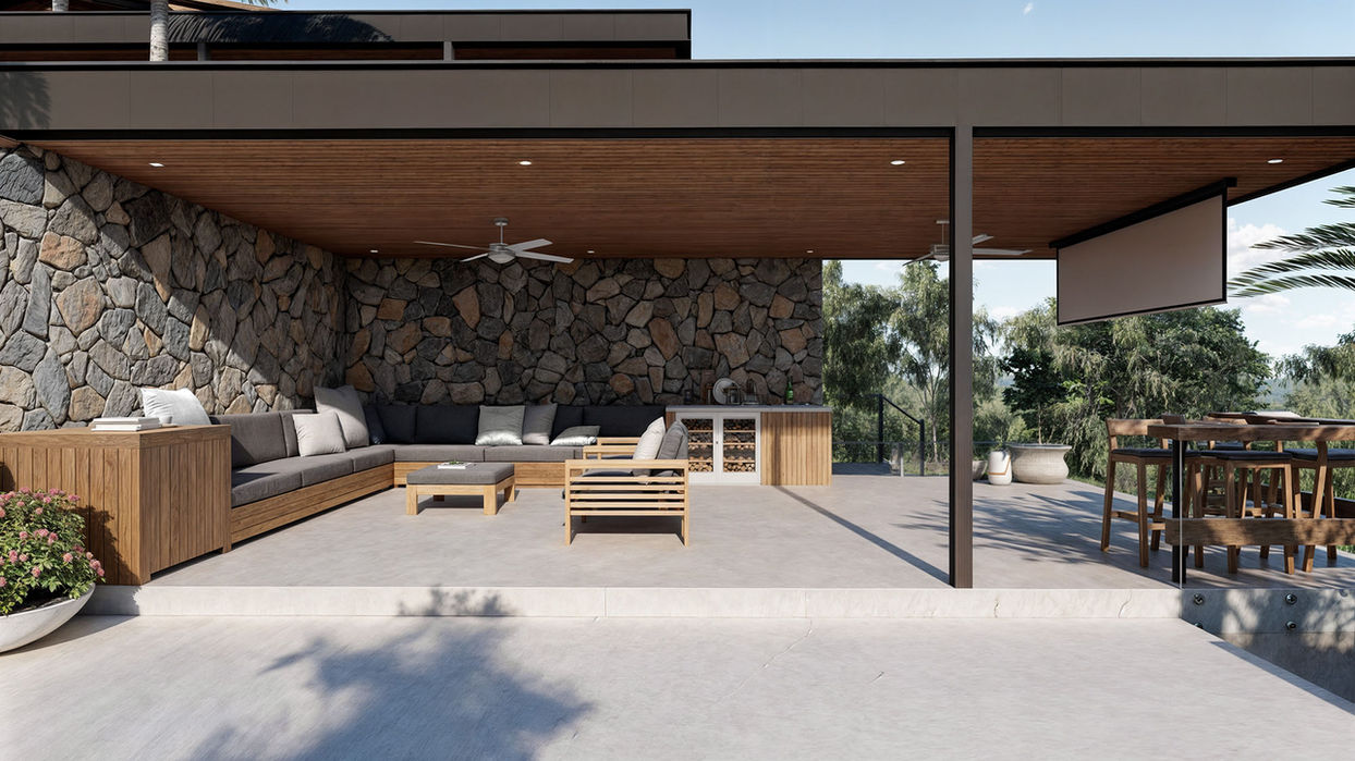 Outdoor entertainment space with lounge chairs, bar and outdoor screen