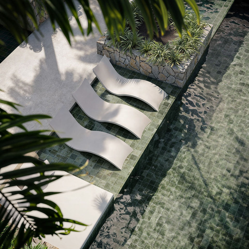 A top down view of the luxury poolside daybeds.