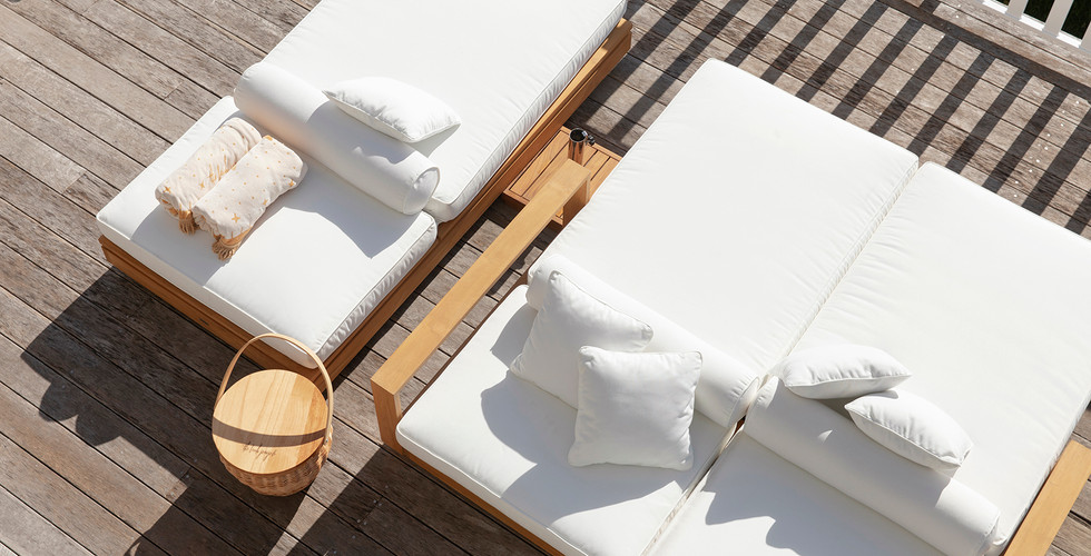 Simple timber constructed sun lounger which is extremely dynamic
