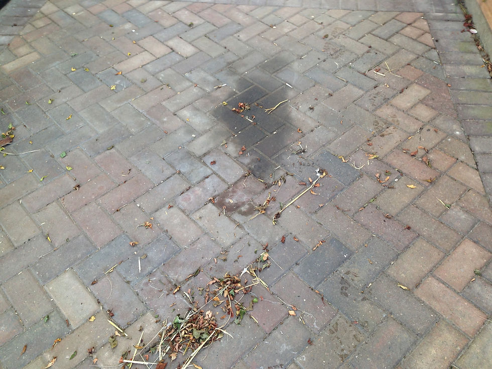 oil stain on block paving driveway