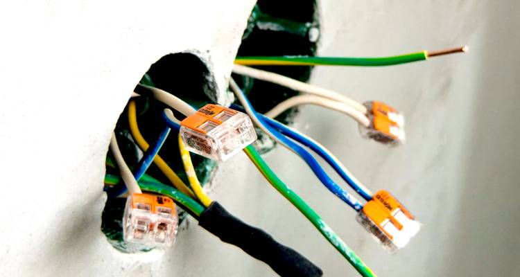 electrician in solihull rewiring an offce