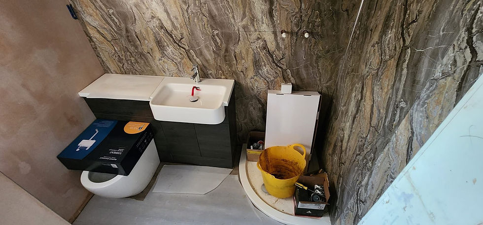 Bathroom vanity and toilet unit mid-installation