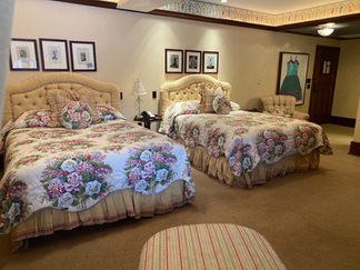 Betty Mae Harris Room featuring the dance costumes and two queen beds.