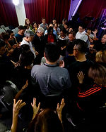 PEOPLE PRAYING TOGETHER IN COVENANT VISION