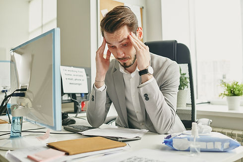 confused-businessman-reading-agreement-A