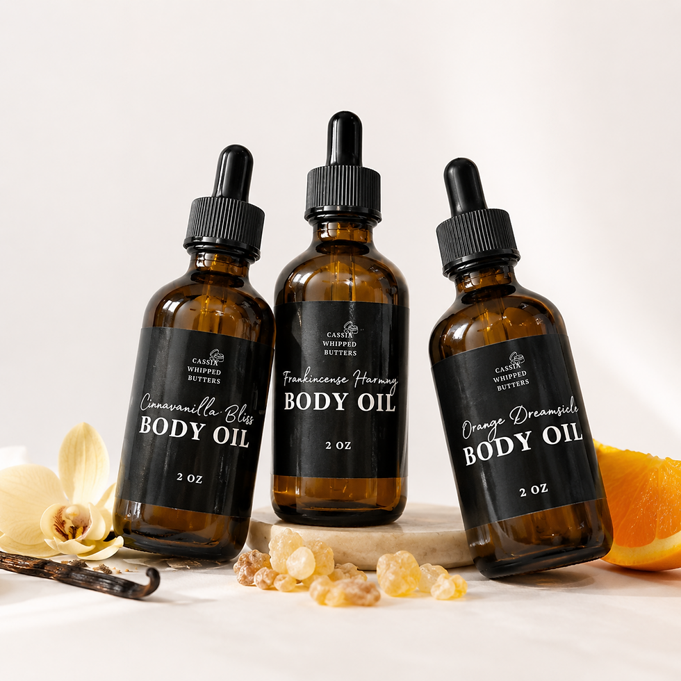 Three CWB Body Oil bottles with vanilla and orange.