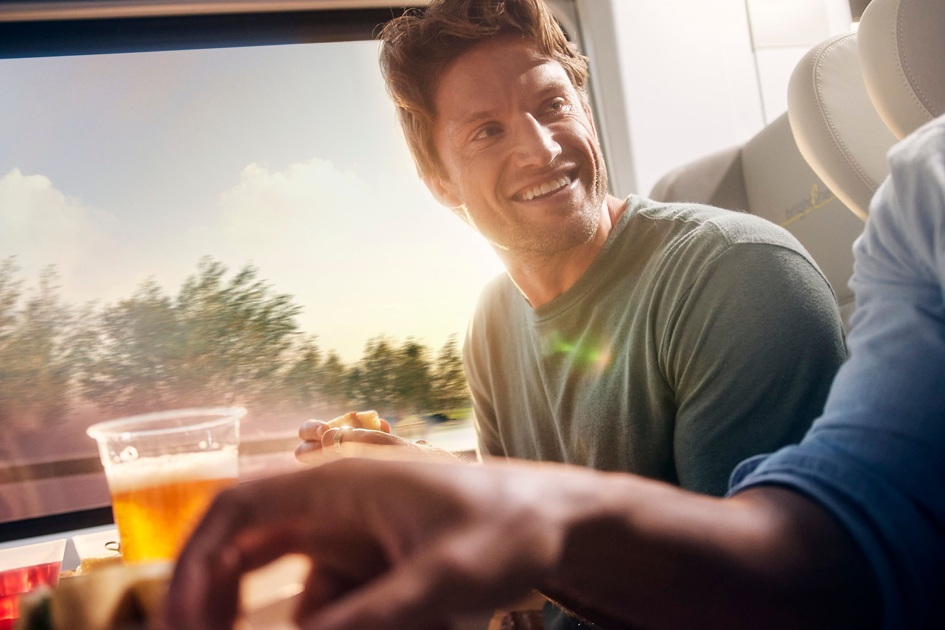 Portrait of talent inside Brightline train captured by Miami lifestyle photographer for advertising campaign