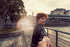 girl holding hands with POV person