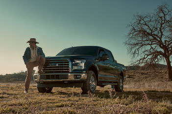 Lifestyle photography of cowboy with Ford pickup truck outdoors