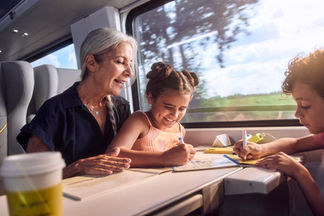 Granmother and grandchild on train drawing