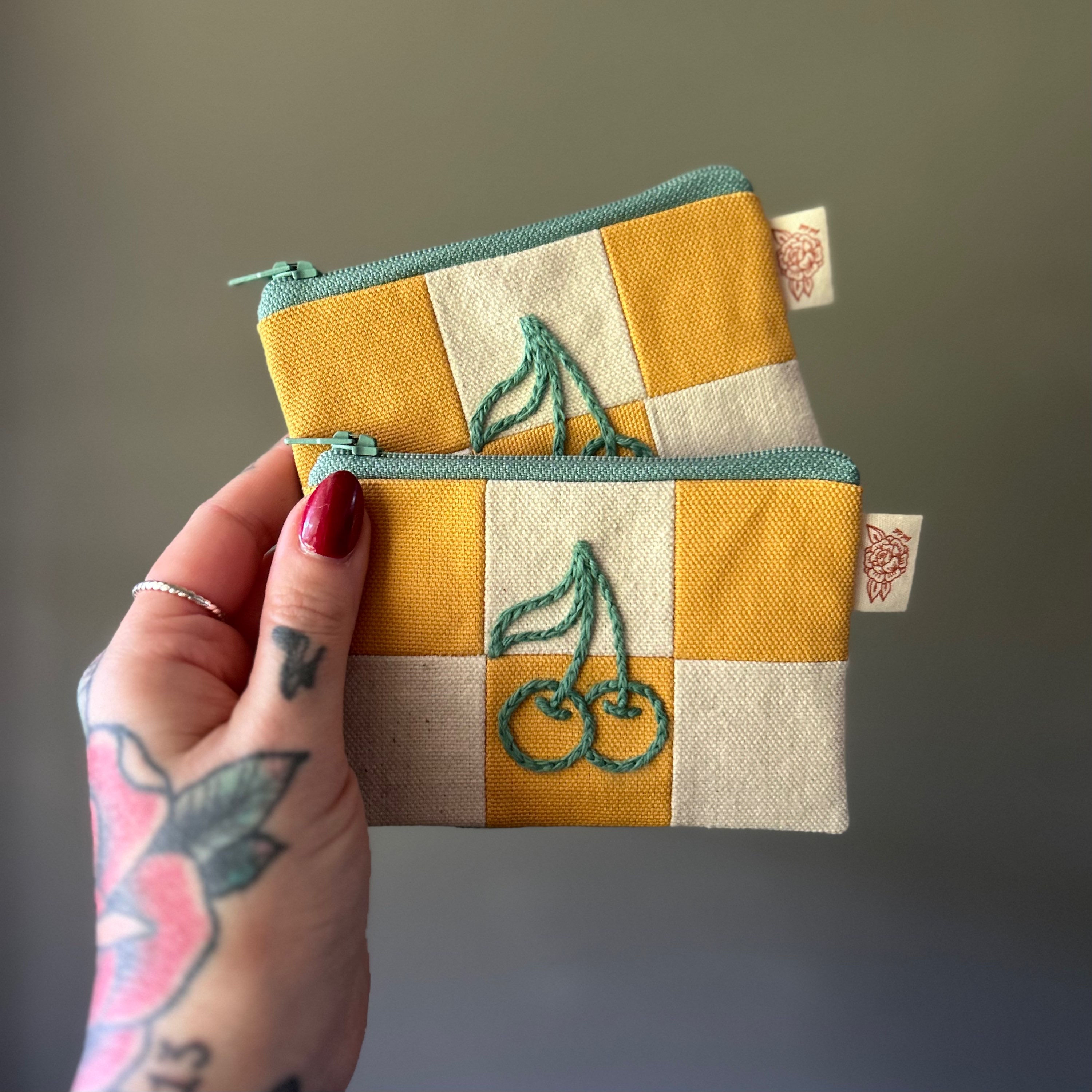 Small zippered yellow & white checkerboard cherries pouch