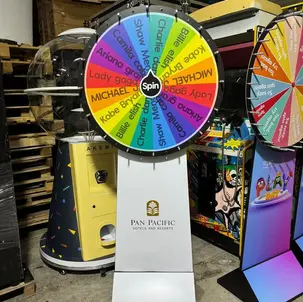 Custom prize wheel rental with event branding for hotel activation