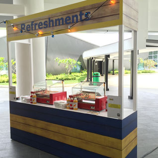 Carnival food stall rental Singapore refreshments booth setup at indoor event venue