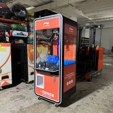 Red Li-Ning customised claw machine rental with branded prizes at a roadshow