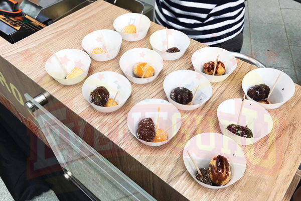 Thumbnail: Churros live station setup with freshly fried churros, cinnamon sugar, and dipping sauces for events.