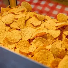 Nacho corn chips at a live nachos and cheese station rental Singapore