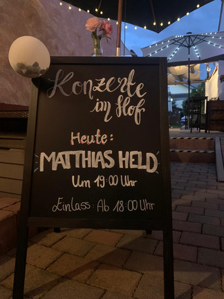 Announcement board for Matthias Held concert